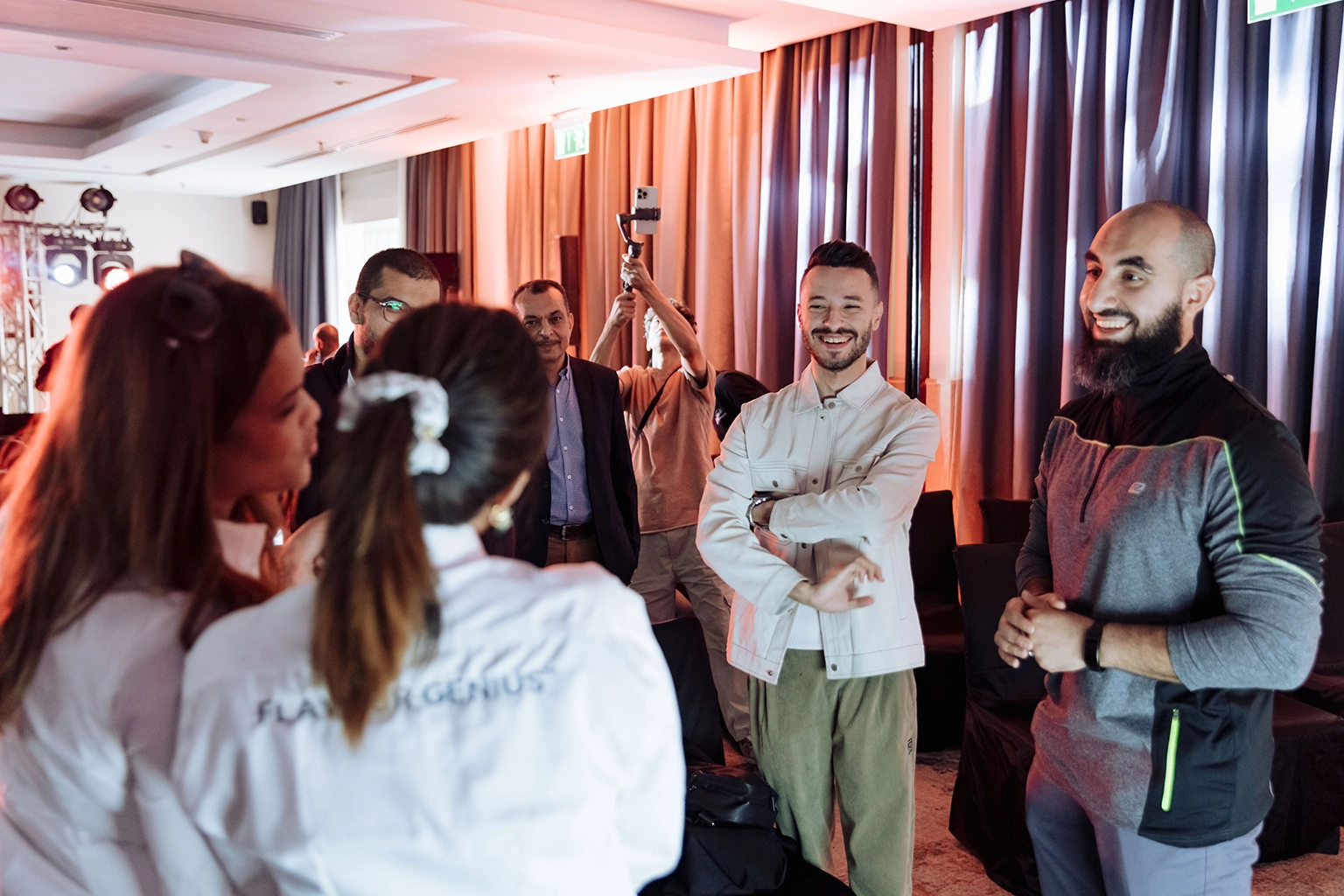Content capture setup at a brand activation, with photography and video crew documenting guest interaction for post-event assets