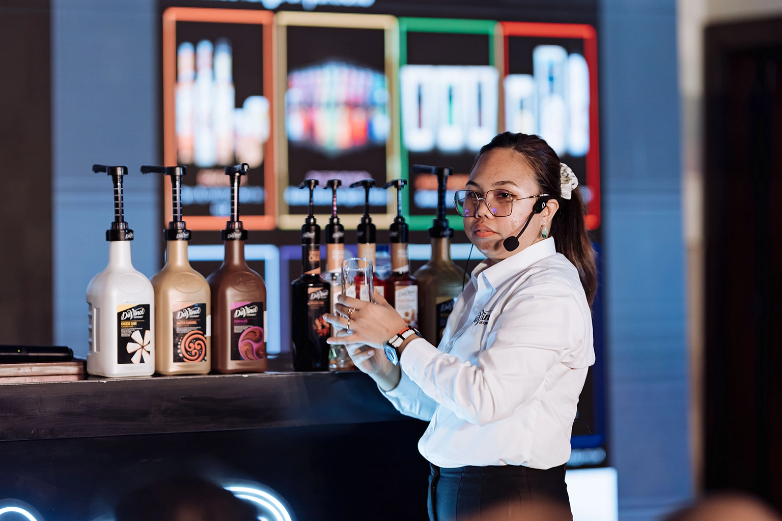 Live product demonstration station staffed at a brand activation in Cairo, with guests interacting directly with the product