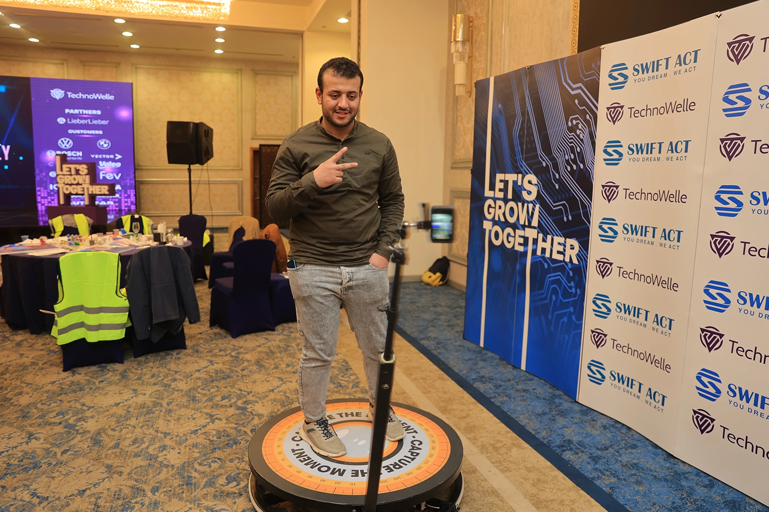 Branded 360-degree photo booth set up as an engagement activity at a corporate team day in Cairo